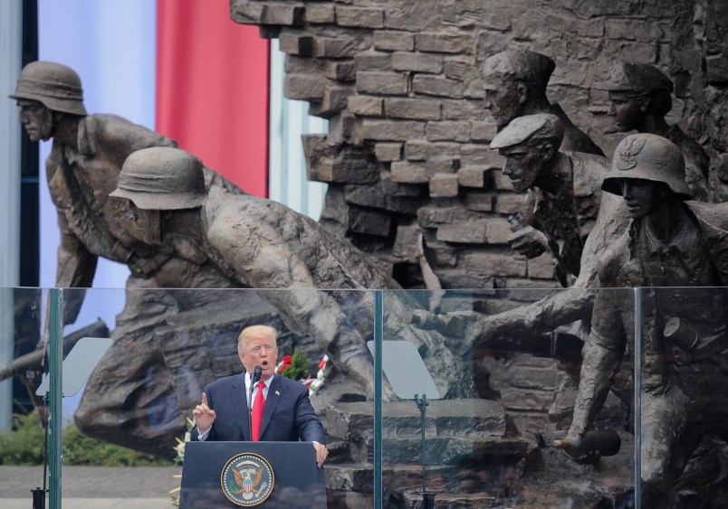 U.S. President Donald Trump delivers a speech in Krasinski Square, back dropped by the monument commemorating the 1944 Warsaw Uprising against the Nazis, in Warsaw, Poland, Thursday, July 6, 2017. (AP Photo/Alik Keplicz)