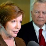 Brenda Fitzgerald, Georgia Department of Public Health commissioner, left, and Gov. Nathan Deal respond to questions about Ebola victims under treatment at Emory University Hospital and stepped up efforts to screen for Ebola among travelers passing through Hartsfield-Jackson International Airport during the governor's visit to Georgia Tech Thursday, Oct. 16, 2014, in Atlanta. A joint emergency isolation unit administered by Emory University Hospital and the Centers for Disease Control and Prevention is currently treating two Ebola-stricken patients. (AP Photo/David Tulis)