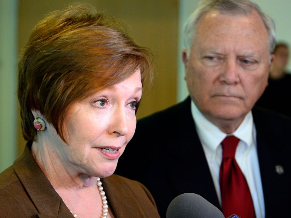 Brenda Fitzgerald, Georgia Department of Public Health commissioner, left, and Gov. Nathan Deal respond to questions about Ebola victims under treatment at Emory University Hospital and stepped up efforts to screen for Ebola among travelers passing through Hartsfield-Jackson International Airport during the governor's visit to Georgia Tech Thursday, Oct. 16, 2014, in Atlanta. A joint emergency isolation unit administered by Emory University Hospital and the Centers for Disease Control and Prevention is currently treating two Ebola-stricken patients. (AP Photo/David Tulis)