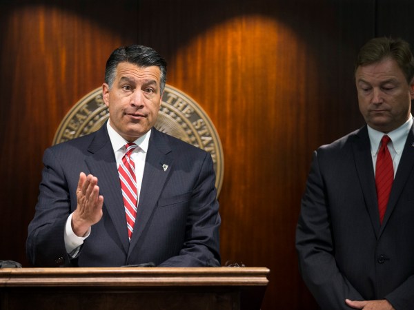 Nevada Gov. Brian Sandoval, left, and Sen. Dean Heller during a press conference where the senator announced he will vote no on the proposed GOP healthcare bill at the Grant Sawyer State Office Building on Friday, June 23, 2017 in Las Vegas. (Erik Verduzco/Las Vegas Review-Journal via AP) LOCAL TELEVISION OUT; LOCAL INTERNET OUT; LAS VEGAS SUN OUT
