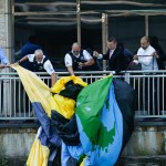 A giant banner from Greenpeace is pulled out of the Chicago River after hanging on the side of Trump Tower in Chicago on Friday, July 7, 2017. (Jose M. Osorio/Chicago Tribune)