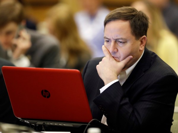 Missouri Secretary of State Jay Ashcroft looks at notes during a voter registration meeting at the the National Association of Secretaries of State conference Saturday, July 8, 2017, in Indianapolis. (AP Photo/Darron Cummings)