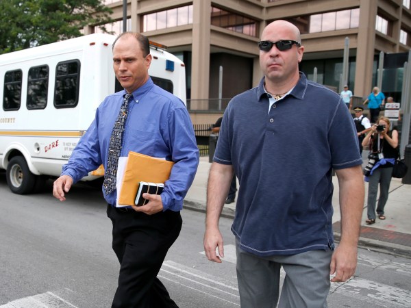 Chicago police officer Thomas Gaffney , left, and former Chicago police officer Joseph Walsh depart the Cook County Courthouse after their arraignment on state felony charges of conspiracy in the investigation of the 2014 shooting death of Laquan McDonald Monday, July 10, 2017, in Chicago. The indictment marks the latest chapter in the history of a police force dogged by allegations of racism and brutality against the city’s black residents. Both pled not guilty on all charges. (AP Photo/Charles Rex Arbogast)