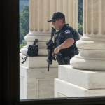 A U.S. Capitol Police officer stands his post at the entrance to the House of Representatives at the Capitol in Washington, Wednesday, June 14, 2017, after Rep. Steve Scalise, who is the majority whip, and a number of aides and Capitol Police officers were injured Wednesday morning in a shooting at a congressional baseball game in Alexandria, Va., Alexandria police say the suspect is in custody. (AP Photo/J. Scott Applewhite)