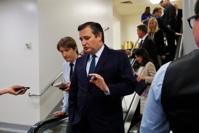 Sen. Ted Cruz, R-Texas, is followed by reporters on Capitol Hill, Tuesday, July 11, 2017. (AP Photo/Jacquelyn Martin)