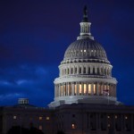 FILE - In this April 4, 2017, file photo, the Capitol is seen at dawn in Washington. Bipartisan bargainers are making progress toward a budget deal to prevent a partial federal shutdown this weekend, a major hurdle overcome when President Donald Trump signaled he would put off his demand that the measure include money to build his border wall with Mexico. (AP Photo/J. Scott Applewhite, File)