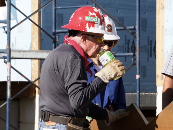 Former U.S. President Jimmy Carter  helps build homes for Habitat for Humanity in Winnipeg on Thursday, July 13, 2017. THE CANADIAN PRESS/HO, Stacia Franz, Manitoba Government *MANDATORY CREDIT*