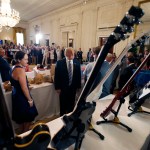 President Donald Trump, second from left, looks at Gibson Guitars, made in Tennessee,  during a "Made in America," product showcase featuring items created in each of the U.S. 50 states, at the White House, Monday, July 17, 2017, in Washington. (AP Photo/Alex Brandon)
