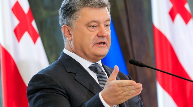Ukrainian President Petro Poroshenko speaks at a press conference during his meeting with Georgian President Georgy Margvelashvili in Tbilisi, Georgia, 18 July 2017. Petro Poroshenko is on an official visit to Georgia.  (AP Photo/Shakh Aivazov)