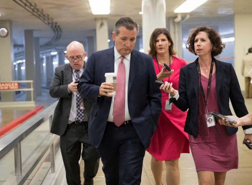 Sen. Ted Cruz, R-Texas, heads to the chamber for a vote, on Capitol Hill in Washington, Thursday, July 20, 2017. Majority Leader Mitch McConnell is spurring Republican senators to resolve internal disputes that have pushed their marquee health care bill to the brink of oblivion, a situation made more difficult for the GOP because of Sen. John McCain's jarring diagnosis of brain cancer. (AP Photo/J. Scott Applewhite)