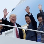 President Donald Trump and Japanese Prime Minister Shinzo Abe wave from the top of the steps of Air Force One at Andrews Air Force Base in Md., Friday, Feb. 10, 2017. Trump is hosting Abe at his estate Mar-a-Lago in Palm Beach, Fla., for the weekend. (AP Photo/Susan Walsh)Akie Abe