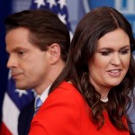 Sarah Huckabee Sanders who has been named White House Press Secretary and White House communications director Anthony Scaramucci pass each other by the podium during the press briefing in the Brady Press Briefing room of the White House in Washington, Friday, July 21, 2017. (AP Photo/Pablo Martinez Monsivais)