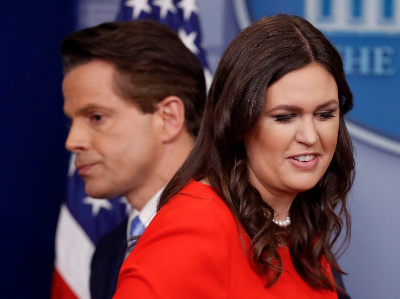 Sarah Huckabee Sanders who has been named White House Press Secretary and White House communications director Anthony Scaramucci pass each other by the podium during the press briefing in the Brady Press Briefing room of the White House in Washington, Friday, July 21, 2017. (AP Photo/Pablo Martinez Monsivais)