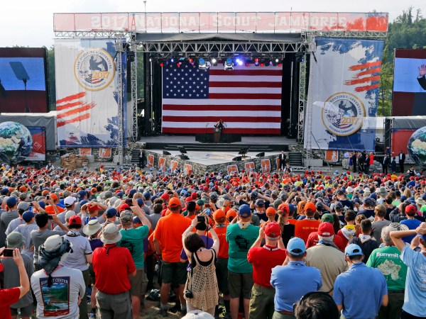 President Donald Trump waves to the crowd of scouts at the 2017 National Boy Scout Jamboree at the Summit in Glen Jean,W. Va., Monday, July 24, 2017.  (AP Photo/Steve Helber)