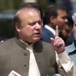 In this Thursday, June 15, 2017 photo, Pakistani Prime Minister Nawaz Sharif speaks to reporters outside the premises of the Joint Investigation Team, in Islamabad, Pakistan. Pakistan’s Supreme Court in a unanimous decision has asked the country’s anti-corruption body to file corruption charges against Prime Minister Nawaz Sharif, his two sons and daughter for concealing their assets. (AP Photo/B.K. Bangash)
