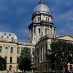 In this Tuesday, May 31, 2016 photo, Illinois lawmakers press ahead on the last day of the spring legislative session inside the Illinois State Capitol in Springfield, Ill. After failing again to approve a state spending plan, Rauner and Democratic leaders in the Illiniois Legislature look to move past a chaotic night and convince voters the other side is to blame for the state's enormous mess. But there's huge political risk for both sides leading up to the November election. (AP Photo/Seth Perlman)