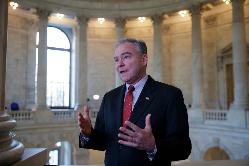 Sen. Tim Kaine, a Virginia Democrat, responds to questions about the poison gas attacks and ongoing “war crimes” in Syria, during a television news interview on Capitol Hill in Washington, Wednesday, April 5, 2017. Kaine blasted blasted President Donald Trump for relying on his criticism of former President Obama’s approach to Syria now that he’s in charge, adding, “He’s got to put on his big boy pants and own up to the job.”   (AP Photo/J. Scott Applewhite)