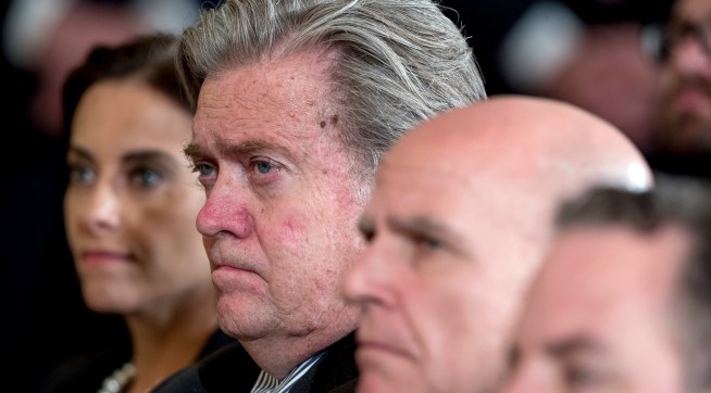 From left, White House Senior Counselor for Economic Initiatives Dina Powell, President Donald Trump's White House Senior Adviser Steve Bannon and National Security Adviser H.R. McMaster attend a news conference with President Donald Trump and NATO Secretary General Jens Stoltenberg in the East Room at the White House, Wednesday, April 12, 2017, in Washington. (AP Photo/Andrew Harnik)