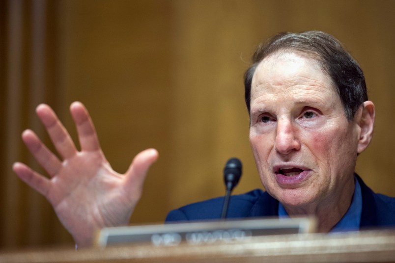 Senate Finance Committee Ranking Member Ron Wyden of Ore., questions IRS Commissioner John Koskinen about President Donald Trump's tax returns, on Capitol Hill in Washington, Thursday, April 6, 2017. (AP Photo/Cliff Owen)