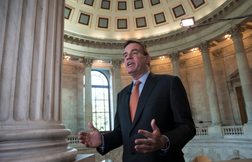Senate Intelligence Committee Vice Chairman Sen. Mark Warner, D-Va., answers questions during a TV news interview at the Capitol in Washington, Tuesday, June 20, 2017.  (AP Photo/J. Scott Applewhite)