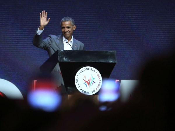Former U.S. President Barack Obama waves prior to delivering his speech during the 4th Congress of Indonesian Diaspora Network in Jakarta, Indonesia, Saturday, July 1, 2017. (AP Photo/Achmad Ibrahim)