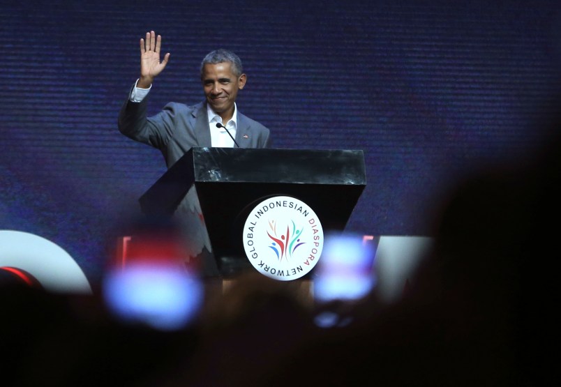 Former U.S. President Barack Obama waves prior to delivering his speech during the 4th Congress of Indonesian Diaspora Network in Jakarta, Indonesia, Saturday, July 1, 2017. (AP Photo/Achmad Ibrahim)