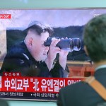 A man walks by a TV screen showing a news program reporting about North Korea's missile firing with an image of North Korean leader Kim Jong Un, at Seoul Train Station in Seoul, South Korea, Tuesday, July 4, 2017. North Korea on Tuesday claimed it successfully test-launched its first intercontinental ballistic missile, a potential game-changing development in what may be the world's most dangerous nuclear standoff and, if true, a direct rebuke to U.S. President Donald Trump's earlier declaration that such a test "won't happen!" (AP Photo/Lee Jin-man)