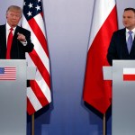 President Donald Trump points to a reporter during a news conference with Polish President Andrzej Duda at Royal Castle, Thursday, July 6, 2017, in Warsaw. (AP Photo/Evan Vucci)