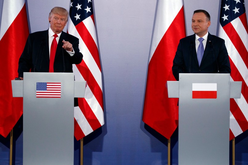 President Donald Trump points to a reporter during a news conference with Polish President Andrzej Duda at Royal Castle, Thursday, July 6, 2017, in Warsaw. (AP Photo/Evan Vucci)