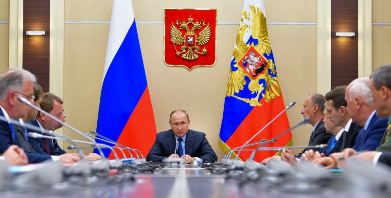 Russian President Vladimir Putin,  center, chairs a meeting of the Commission for Military Technology Cooperation at the Novo-Ogaryovo residence outside Moscow, Russia, Thursday, July 6, 2017.  (Alexei Druzhinin, Sputnik,  Kremlin Pool Photo via AP)