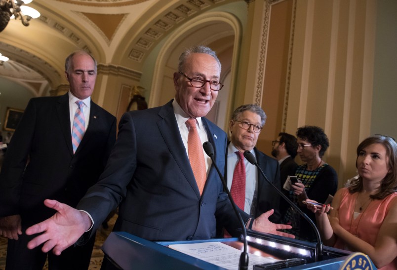 Senate Minority Leader Chuck Schumer, D-N.Y., flanked by Sen. Bob Casey, D-Pa., left, and Sen. Al Franken, D-Minn., criticizes the Republican health care bill during a news conference on Capitol Hill in Washington, Tuesday, July 11, 2017. Senate Majority Leader Mitch McConnell, R-Ky., said he will unveil their revised health care bill Thursday and begin voting on it next week.  (AP Photo/J. Scott Applewhite)