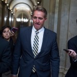UNITED STATES - JULY 13: Sen. Jeff Flake, R-Ariz., talks with reporters in the Capitol after a meeting where Senate Republicans' unveiled and updated health care bill on July 13, 2017. (Photo By Tom Williams/CQ Roll Call)