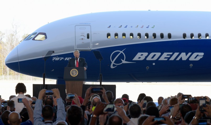 President Donald Trump speaks in front of the Boeing 787 Dreamliner while visiting the Boeing South Carolina facility in North Charleston, S.C., Friday, Feb. 17, 2017. Trump is visiting Boeing before heading to his Mar-a-Lago estate in Palm Beach, Fla., for the weekend. (AP Photo/Susan Walsh)