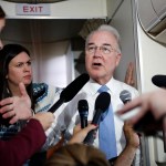 Secretary of Health and Human Services Tom Price, joined by White House press secretary Sarah Huckabee Sanders, speaks to media aboard Air Force One, Monday, July 24, 2017, in Andrews Air Force Base, Md., en route to the 2017 National Scout Jamboree in Glen Jean, W.Va. (AP Photo/Carolyn Kaster)