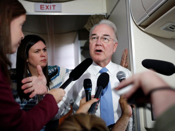 Secretary of Health and Human Services Tom Price, joined by White House press secretary Sarah Huckabee Sanders, speaks to media aboard Air Force One, Monday, July 24, 2017, in Andrews Air Force Base, Md., en route to the 2017 National Scout Jamboree in Glen Jean, W.Va. (AP Photo/Carolyn Kaster)
