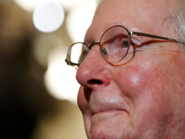 Senate Majority Leader Mitch McConnell of Ky., smiles as he talks to reporters on Capitol Hill in Washington, Tuesday, July 25, 2017, after Vice President Mike Pence broke a 50-50 tie to start debating Republican legislation to tear down much of the Obama health care law. (AP Photo/Jacquelyn Martin)