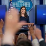 Reporters raises their hands as White House press secretary Sarah Huckabee Sanders answers question during the press briefing in the Brady Press Briefing room of the White House in Washington, Wednesday, July 26, 2017. (AP Photo/Pablo Martinez Monsivais)