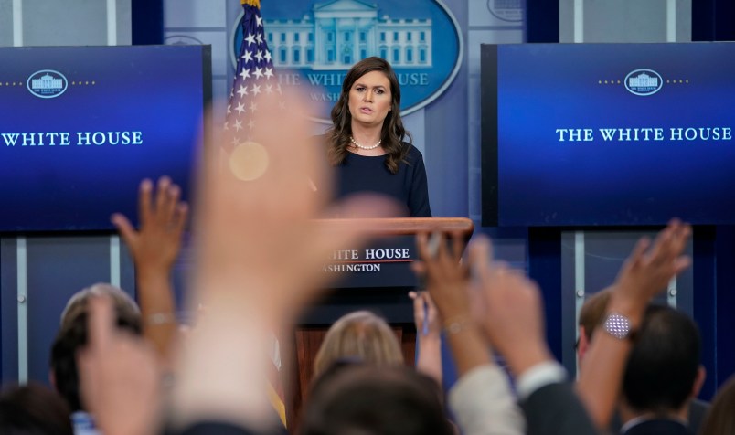 Reporters raises their hands as White House press secretary Sarah Huckabee Sanders answers question during the press briefing in the Brady Press Briefing room of the White House in Washington, Wednesday, July 26, 2017. (AP Photo/Pablo Martinez Monsivais)