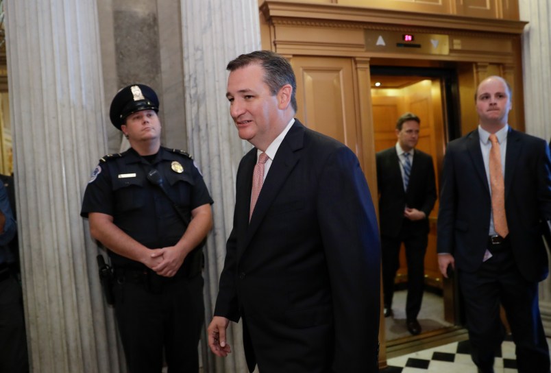 Sen. Ted Cruz, R-Texas, arrives for a vote as the Republican-run Senate rejected a GOP proposal to scuttle President Barack Obama's health care law and give Congress two years to devise a replacement, Wednesday, July 26, 2017,  at the Capitol in Washington.  President Donald Trump and Senate Majority Leader Mitch McConnell, R-Ky., have been stymied by opposition from within the Republican ranks.  (AP Photo/J. Scott Applewhite)