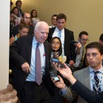 Sen. John McCain, R-Az., is pursued by reporters after casting a 'no' vote on a a measure to repeal parts of former President Barack Obama's health care law, on Capitol Hill in Washington, Friday, July 28, 2017. (AP Photo/Cliff Owen)