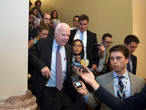 Sen. John McCain, R-Az., is pursued by reporters after casting a 'no' vote on a a measure to repeal parts of former President Barack Obama's health care law, on Capitol Hill in Washington, Friday, July 28, 2017. (AP Photo/Cliff Owen)