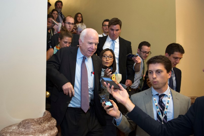 Sen. John McCain, R-Az., is pursued by reporters after casting a 'no' vote on a a measure to repeal parts of former President Barack Obama's health care law, on Capitol Hill in Washington, Friday, July 28, 2017. (AP Photo/Cliff Owen)