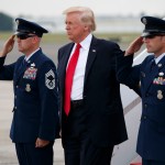 President Donald Trump steps off Air Force One after arriving at Long Island MacArthur Airport to deliver a speech on the street gang MS-13, Friday, July 28, 2017, in Ronkonkoma, N.Y. (AP Photo/Evan Vucci)