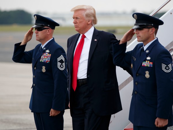 President Donald Trump steps off Air Force One after arriving at Long Island MacArthur Airport to deliver a speech on the street gang MS-13, Friday, July 28, 2017, in Ronkonkoma, N.Y. (AP Photo/Evan Vucci)