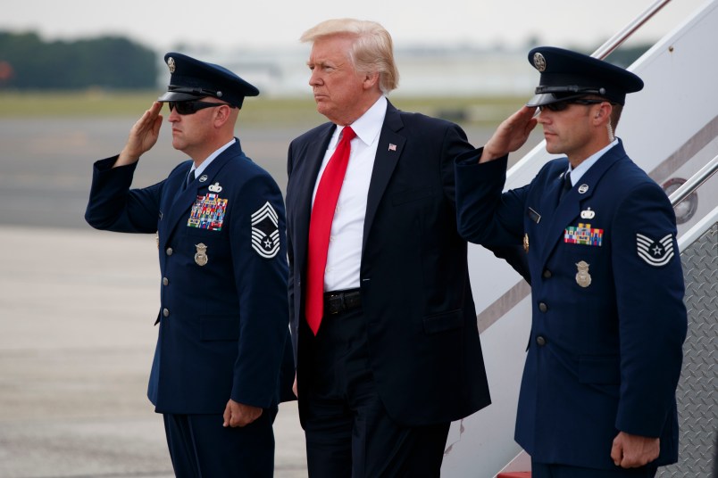 President Donald Trump steps off Air Force One after arriving at Long Island MacArthur Airport to deliver a speech on the street gang MS-13, Friday, July 28, 2017, in Ronkonkoma, N.Y. (AP Photo/Evan Vucci)
