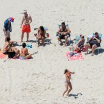 NJ Gov. Chris Christie (right) and his family enjoy a picture perfect Sunday afternoon at the beach on Island Beach State Park, which is closed to the public due to the state government shutdown.  7/2/17  (Andrew Mills | NJ Advance Media for NJ.com)
