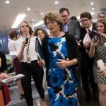 Sen. Lisa Murkowski, R-Alaska, heads to the chamber for a vote, on Capitol Hill in Washington, Thursday, July 20, 2017. Majority Leader Mitch McConnell is spurring Republican senators to resolve internal disputes that have pushed their marquee health care bill to the brink of oblivion, a situation made more difficult for the GOP because of Sen. John McCain's jarring diagnosis of brain cancer. (AP Photo/J. Scott Applewhite)