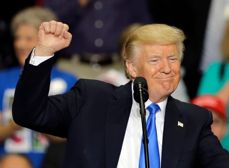 President Donald Trump pumps his fist and smiles as he speaks at the Covelli Centre, Tuesday, July 25, 2017, in Youngstown, Ohio. (AP Photo/Tony Dejak)