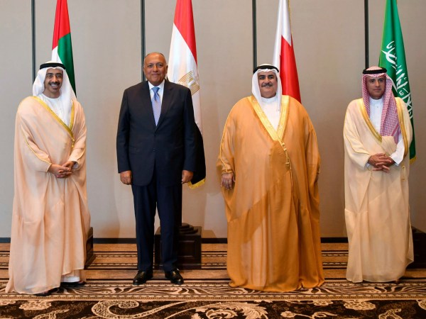 In this Sunday, July 30, 2017 photo released by Bahrain News Agency, from left to right, Foreign Ministers of UAE Abdullah bin Zayed al-Nahyan, Egypt's Sameh Shoukry, Bahrain's Khalid bin Ahmed al-Khalifa and Saudi's Adel al-Jubeir, pose for a photo during their meeting in Manama, Bahrain. Four Arab states that cut ties with Qatar met Sunday to discuss the diplomatic crisis, insisting on compliance with a list of sweeping demands while refraining for now from imposing more punitive measures against the Gulf state. (Bahrain News Agency via AP)