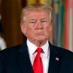 President Donald Trump stands as he waits to bestow the nation's highest military honor, the Medal of Honor to retired Army medic James McCloughan during a ceremony in the East Room of the White House in Washington, Monday, July 31, 2017. McCloughan is credited with saving the lives of members of his platoon nearly 50 years ago in the Battle of Nui Yon Hill in Vietnam. (AP Photo/Pablo Martinez Monsivais)